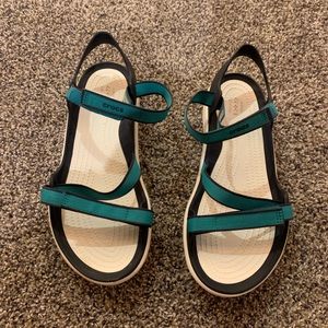 Crocs swiftwater turquoise and black sandal. Size 11. Womens.